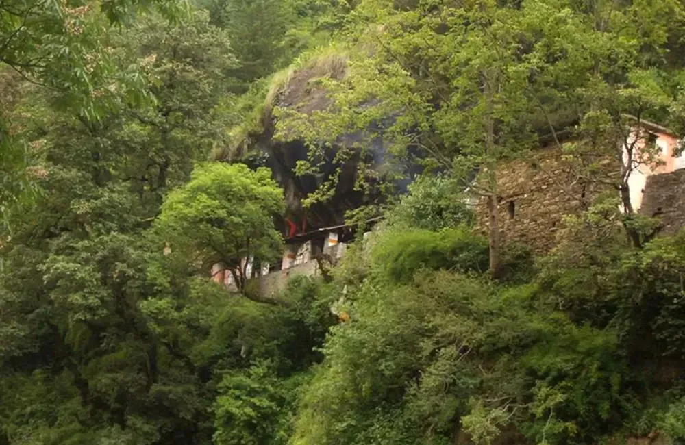 Kalpeshwar Mahadev Temple inside a natural cave, Urgam Valley, Chamoli, Uttarakhand — fifth and most accessible Kedar where Shiva's matted locks are venerated